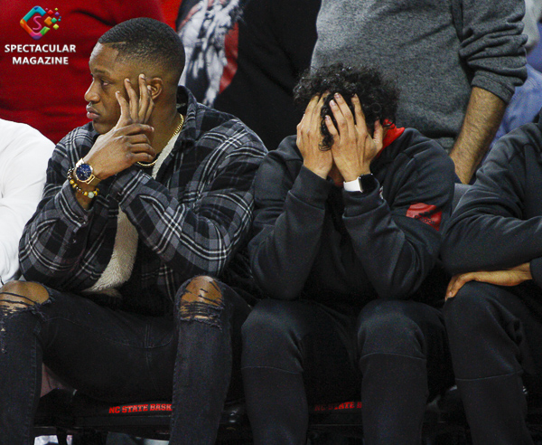 N.C. State's leading scorer and rebounder C.J. Bryce (left) and Chase Graham (right) watch the game against Notre Dame from the bench on Wednesday, Jan. 8, at PNC Arena in Raleigh, N.C. NCST defeated ND 73-68 in their third consecutive game without Bryce.