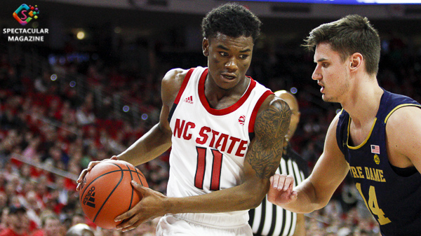 N.C. State's Markell Johnson (11) drives to the basket against Notre Dame's Nate Laszewski (11) during the first half on Wednesday, Jan. 8, at PNC Arena in Raleigh, N.C. NCST defeated ND 73-68.