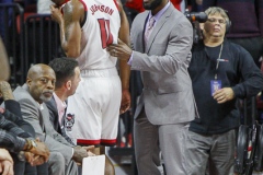 N.C. State's Markell Johnson grimaces from back spasams during the first half against Notre Dame on Wednesday, Jan. 8, at PNC Arena in Raleigh, N.C. NCST defeated ND 73-68.