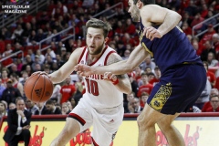 N.C. State's Braxton Beverly drives to the basket against Notre Dame's Nikola Djogo during the second half on Wednesday, Jan. 8, at PNC Arena in Raleigh, N.C. NCST defeated ND 73-68.