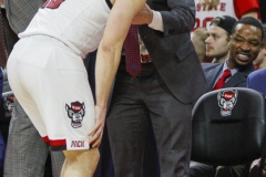 N.C. State's Braxton Berverly grabs leg due to discomfort during the second half against Notre Dame on Wednesday, Jan. 8, at PNC Aretena in Raleigh, N.C. NCST defeated ND 73-68.