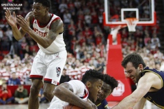 N.C. State's Markell Johnsno tries to call a timeout during a loose ball during the second half against Notre Dame on Wednesday, Jan. 8, at PNC Arena in Raleigh, N.C. NCST defeated ND 73-68.