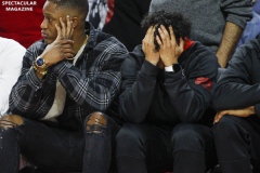 N.C. State's leading scorer and rebounder C.J. Bryce (left) and Chase Graham (right) watch the game against Notre Dame from the bench on Wednesday, Jan. 8, at PNC Arena in Raleigh, N.C. NCST defeated ND 73-68 in their third consecutive game without Bryce.