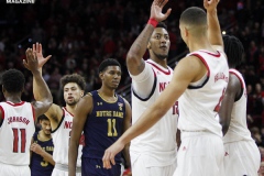 N.C. State players high-five during the second half against Notre Dame on Wednesday, Jan. 8, at PNC Arena in Raleigh, N.C. NCST defeated ND 73-68.