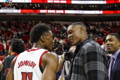 N.C. State's Markell Johnson (left) and C.J. Bryce (right) celebrate after defeating Notre Dame 73-68 on Wednesday, Jan. 8, at PNC Arena in Raleigh, N.C.