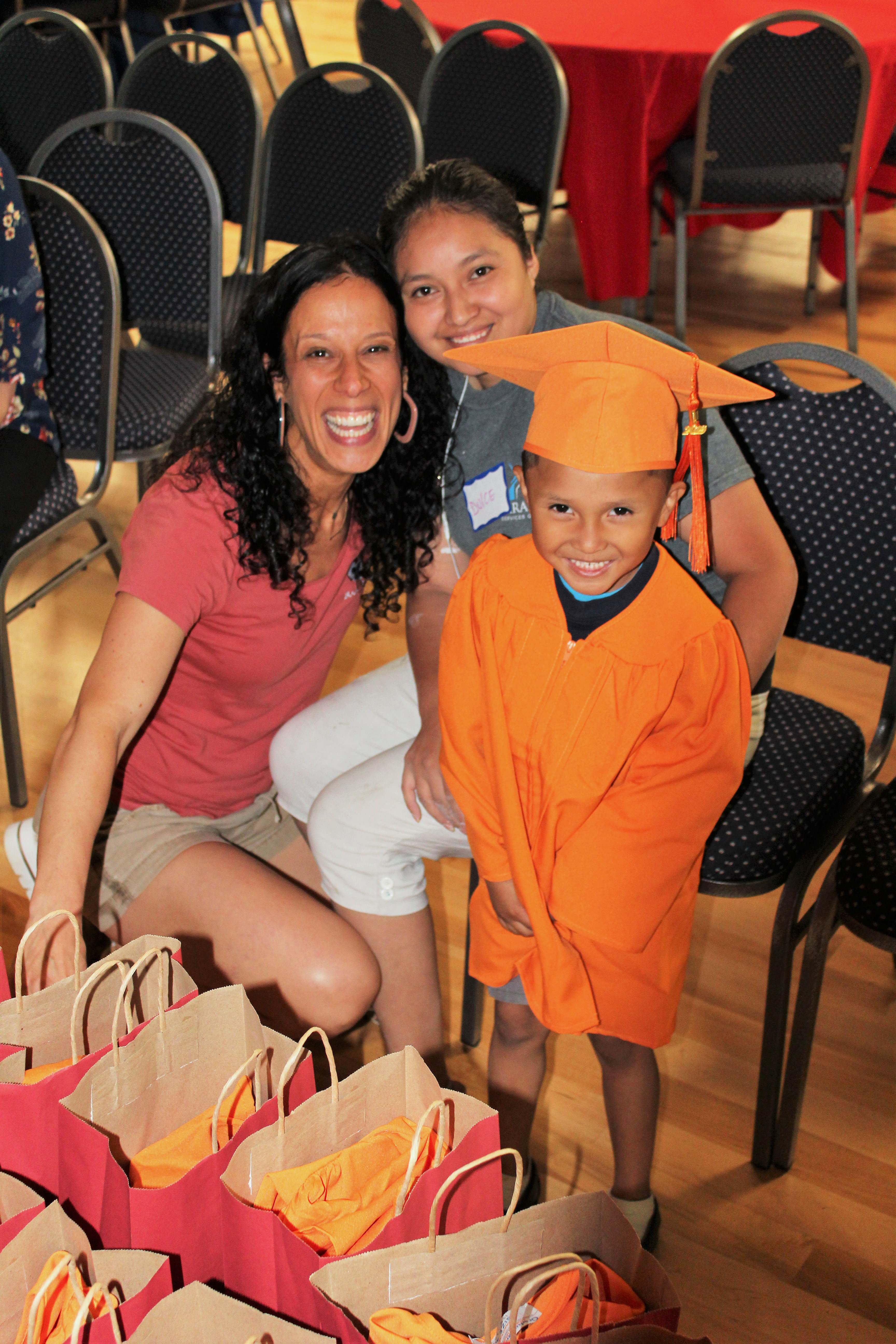 meytal-boy-and-mom-cap-and-gown-fitting