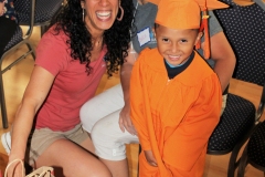 meytal-boy-and-mom-cap-and-gown-fitting