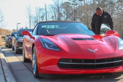 Member of Vettes Unlimited inspect his car before Parade. (Photo: Landon Bost)