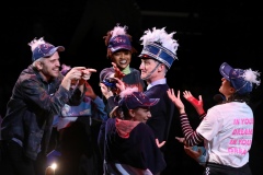 RAGTIME-07_Ray-Dooley-as-Henry-Ford-with-members-of-the-ensemble_Directed-by-Zi-Alikhan_HuthPhoto