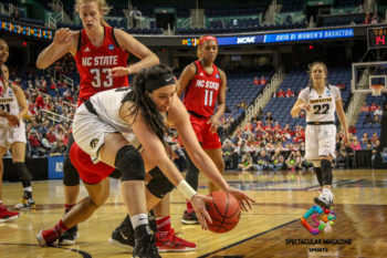 Hawkeye senior center Megan Gustafson receiving an entry pass.