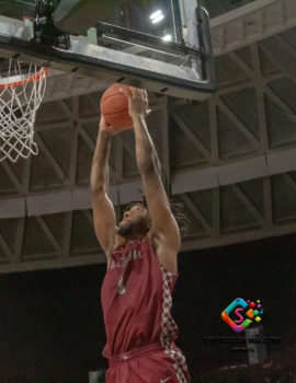 Eagles senior forward Zacarry Douglas going up . for a dunk.