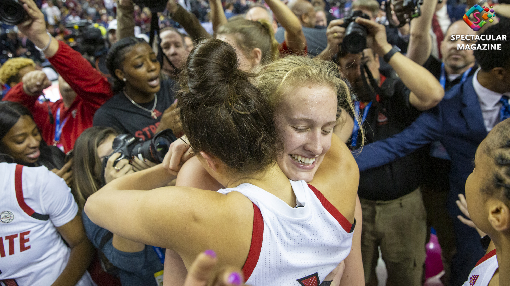 NC State senior guard Aislinn Konig (front) and sophomore center Elissa Cunane (back) hug after defeating Florida State 71-66 in the 2020 ACC Women’s Basketball Tournament Championship at the Greensboro Coliseum in Greensboro, N.C., Sunday, Mar. 8, 2020. 2020 ACC Women's Tournament. NC State 2020 ACC Women's Tournament Champions