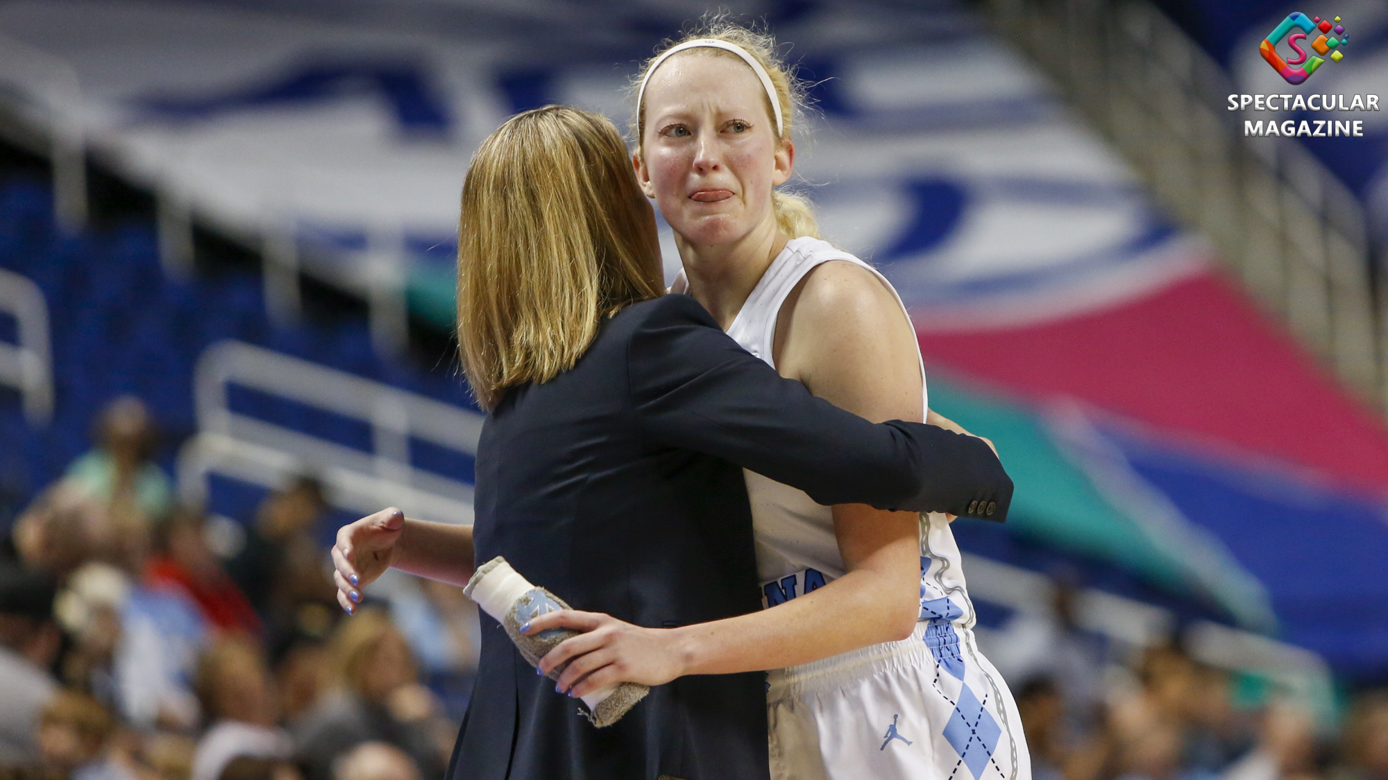 North Carolina coach Courtney Banghart hugs senior guard Taylor Koenen after fouling out of game against Wake Forest with 5:37 left in the fourth period in the first round of the ACC Women’s Tournament at the Greensboro Coliseum in Greensboro, N.C., Wednesday, Mar. 4, 2020. WFU defeated UNC 83-73.