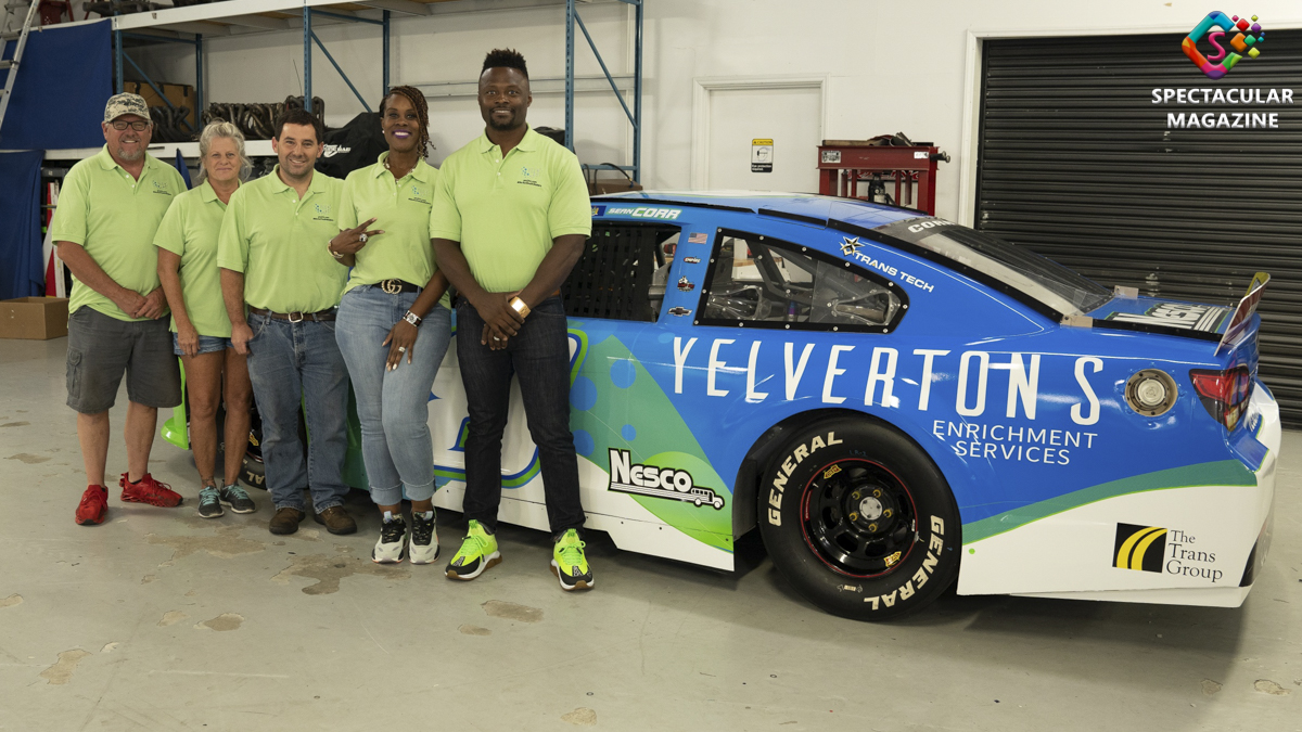(Left to Right), Mike "Grumpy" Cheek, Sherry Cheek, Sean Corr, Vickie Yelverton, Antwane Yelverton stand next to the Yelverton Enrichment Services themed car that Corr will race during the ARCA Menard's Series General Tire 200 at Talladega Superspeedway in Lincoln, Ala., Saturday, June 20. Photo courtesy of YES