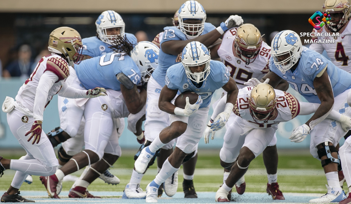 UNC Football Garrett Lynch reporter Spectacular Magazine