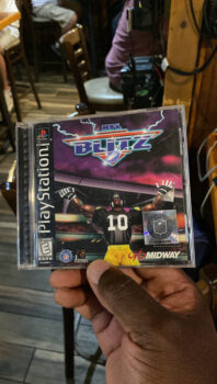 NFL Blitz, Cozzi Cozzman, Thomas Tripp, Video Games, Football, Nintendo, PlayStation, Sega Genesis, Spectacular Magazine 