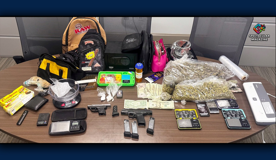 Hillsborough men. Seized drugs, firearms, cash, and distribution equipment displayed on a table following Hillsborough drug bust.
