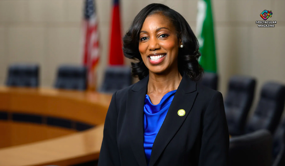 Estella Patterson smiles in a professional headshot with the Charlotte skyline behind her. Text overlay reads: “Charlotte’s First Female Police Chief.”