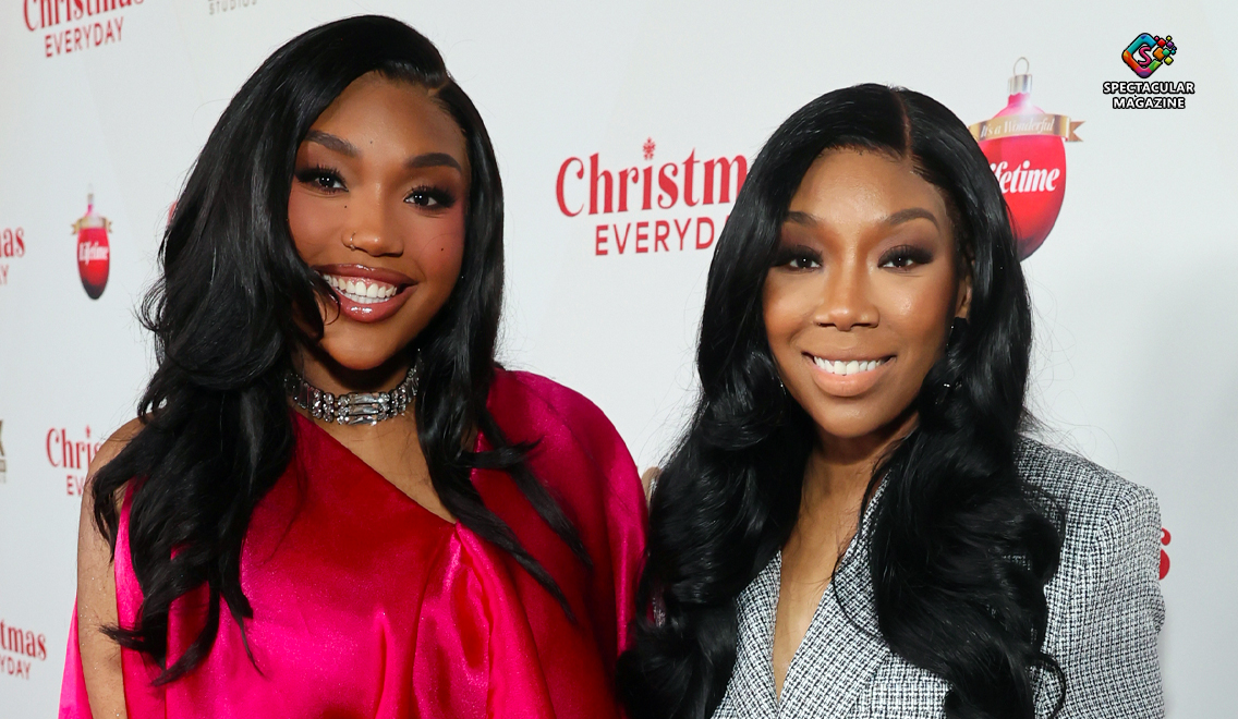 Brandy Norwood and Sy’rai Smith share a joyful hug at Christmas Everyday premiere