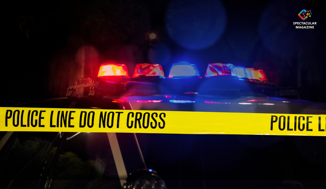 Raleigh Police car with blue and red lights flashing outside a business district, representing an active investigation in Brier Creek.