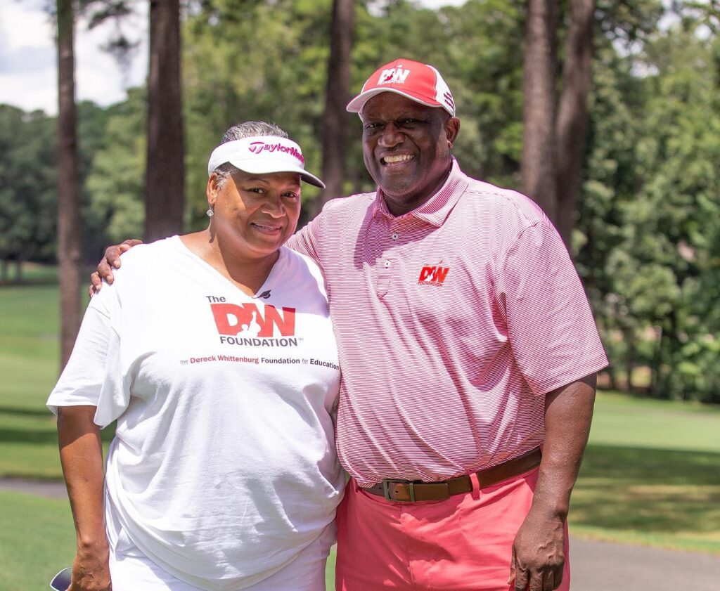 Dereck and Jacqueline Whittenburg smile together at The Dereck Whittenburg Foundation Celebrity Golf Invitational, the cornerstone event that raises scholarship funds for need-based college students.