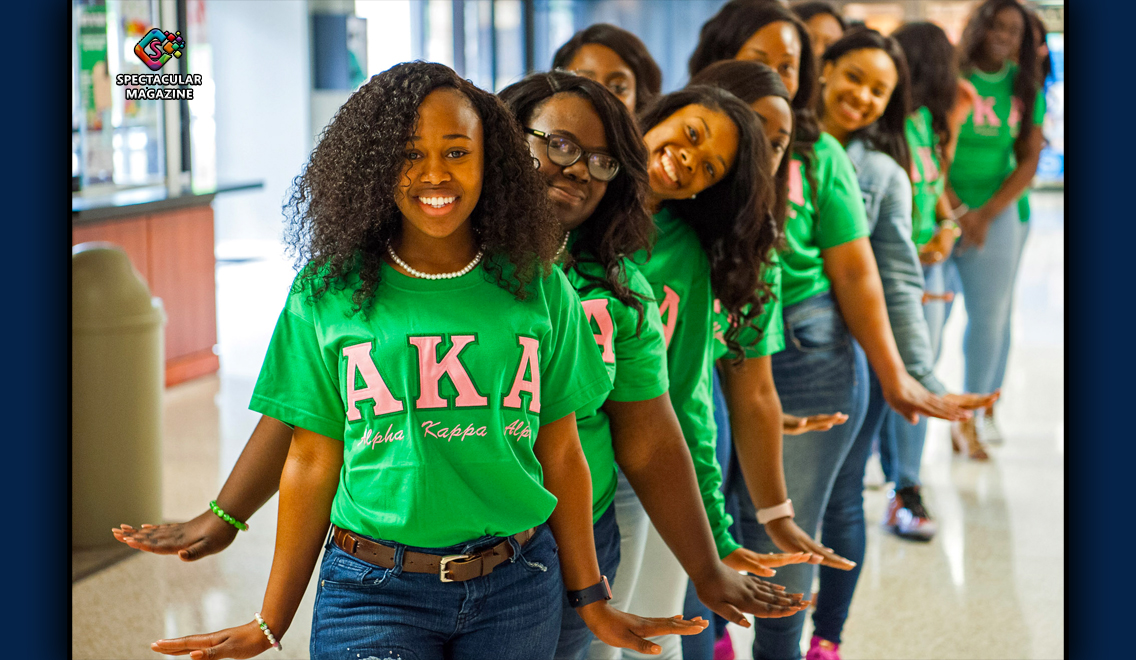 Members of Alpha Kappa Alpha Sorority, Incorporated participate in a traditional sorority line formation celebrating sisterhood and unity.