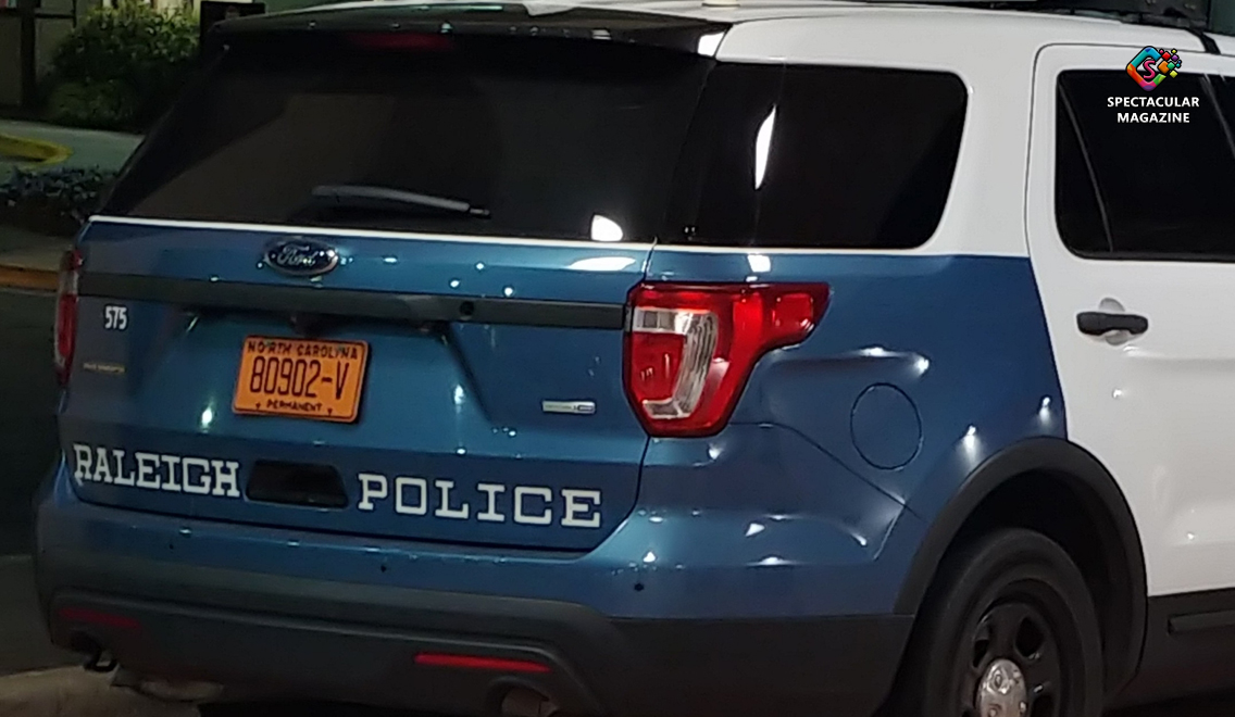 Raleigh Police vehicle responding to bank robbery investigation on Western Boulevard