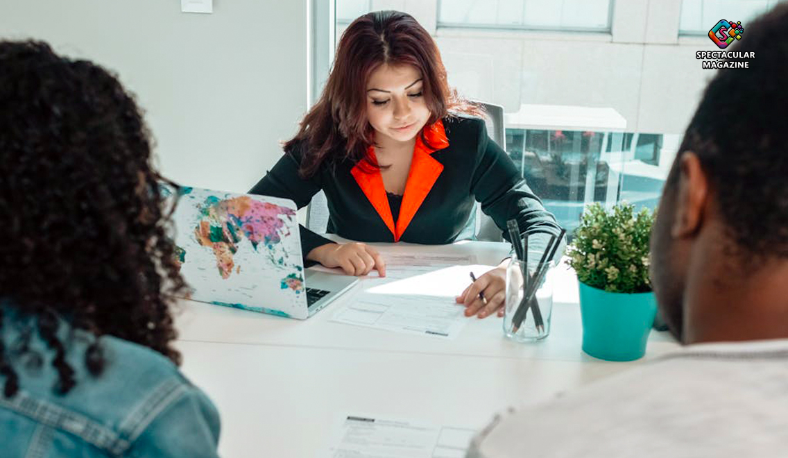 Social workers meeting with family discussing services in confidential setting